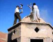 Muslims taking down cross from church in Egypt