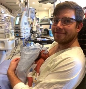 Dylan and Iver Benson enjoy a hug after his birth Saturday.